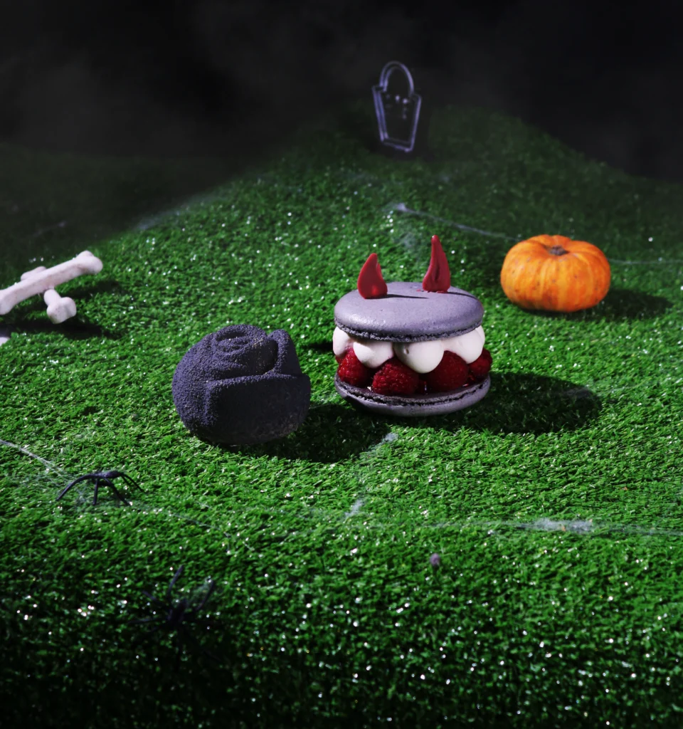 Selection box of 2, Green grass, Dark background, Halloween themed cakes